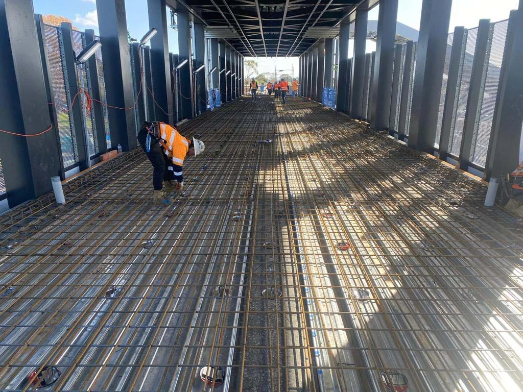 Reinforcement and formwork for a bridge slab